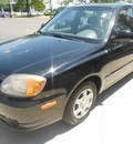hyundai accent 2005 black sedan gasoline 4 cylinders front wheel drive not specified 43228