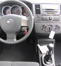 nissan versa 2012 black hatchback s gasoline 4 cylinders front wheel drive 6 speed manual 33884