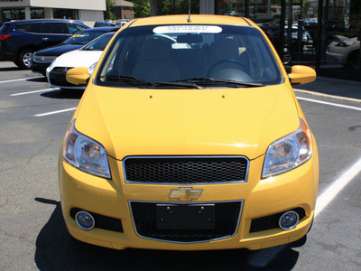 chevrolet aveo 2011 yellow hatchback aveo5 lt gasoline 4 cylinders front wheel drive automatic 27215