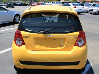 chevrolet aveo 2011 yellow hatchback aveo5 lt gasoline 4 cylinders front wheel drive automatic 27215