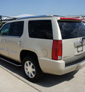 cadillac escalade 2009 gold suv flex fuel 8 cylinders all whee drive automatic 76087