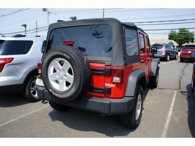 jeep wrangler unlimited 2011 red suv sport gasoline 6 cylinders 4 wheel drive automatic with overdrive 08902