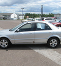 mazda protege 2002 silver sedan lx gasoline 4 cylinders front wheel drive 5 speed manual 55811