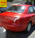 kia rio 2002 red sedan gasoline 4 cylinders front wheel drive 5 speed manual 43560