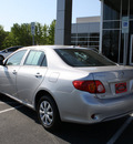 toyota corolla 2010 silver sedan le gasoline 4 cylinders front wheel drive automatic 27215