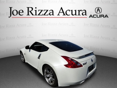 nissan 370z 2010 white coupe gasoline 6 cylinders rear wheel drive automatic with overdrive 60462