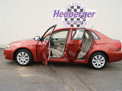 subaru impreza 2009 red sedan 2 5i gasoline 4 cylinders all whee drive automatic 80905