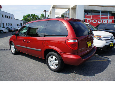 dodge caravan 2006 inferno red van sxt gasoline 6 cylinders front wheel drive automatic 07724
