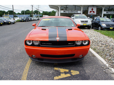 dodge challenger 2009 hemi orange coupe srt8 gasoline 8 cylinders rear wheel drive 6 speed manual 07724