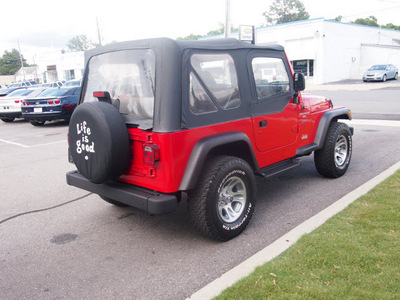 jeep wrangler 1998 red suv sport gasoline 6 cylinders 4 wheel drive 5 speed manual 27591