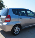 honda fit 2007 gray hatchback gasoline 4 cylinders front wheel drive 5 speed manual 76018