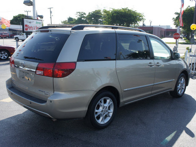 toyota sienna 2005 lt  brown van xle limited 7 passenger gasoline 6 cylinders front wheel drive automatic 33021