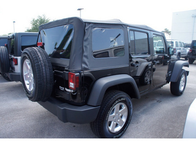 jeep wrangler unlimited 2012 black suv sport gasoline 6 cylinders 4 wheel drive automatic 33157