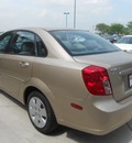suzuki forenza 2008 beige sedan gasoline 4 cylinders front wheel drive not specified 43228