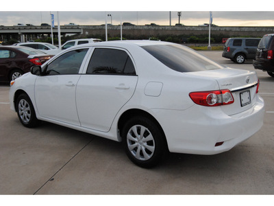 toyota corolla 2011 white sedan gasoline 4 cylinders front wheel drive 5 speed manual 77065