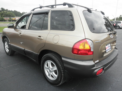 hyundai santa fe 2004 gold suv gls gasoline 6 cylinders front wheel drive automatic 34474