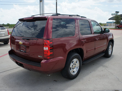 chevrolet tahoe 2010 red suv lt flex fuel 8 cylinders 2 wheel drive automatic 76087