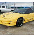 pontiac firebird 2002 yellow coupe trans am gasoline 8 cylinders rear wheel drive standard 77090