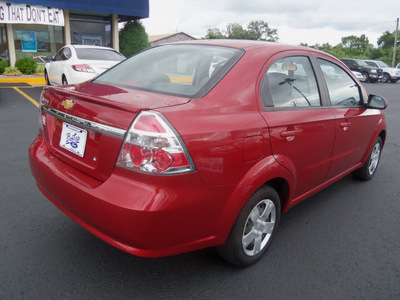 chevrolet aveo 2010 red sedan lt gasoline 4 cylinders front wheel drive automatic 37087