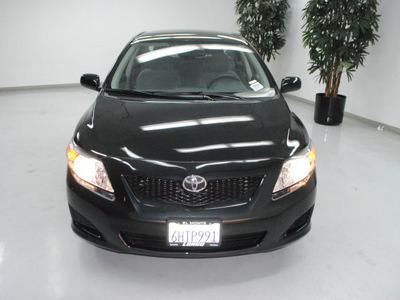 toyota corolla 2010 black sedan le gasoline 4 cylinders front wheel drive automatic 91731