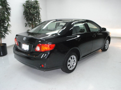 toyota corolla 2010 black sedan le gasoline 4 cylinders front wheel drive automatic 91731