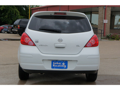 nissan versa 2009 white hatchback 1 8 s gasoline 4 cylinders front wheel drive automatic with overdrive 77037