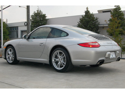 porsche 911 2009 silver coupe carrera gasoline 6 cylinders 6 speed manual 77002