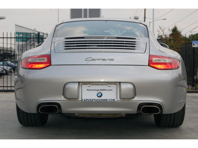 porsche 911 2009 silver coupe carrera gasoline 6 cylinders 6 speed manual 77002