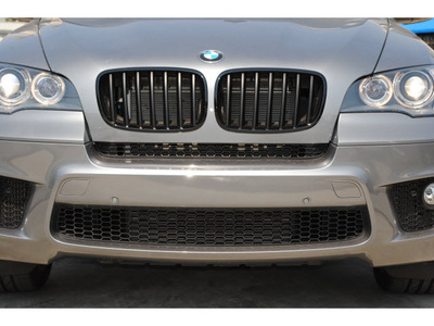 bmw x5 2011 gray xdrive50i gasoline 8 cylinders all whee drive automatic 77002