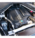 bmw x5 2011 black xdrive35i gasoline 6 cylinders all whee drive automatic 77002