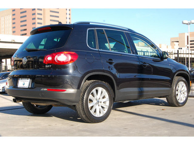 volkswagen tiguan 2009 black suv gasoline 4 cylinders front wheel drive automatic 77002