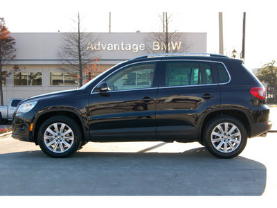 volkswagen tiguan 2009 black suv gasoline 4 cylinders front wheel drive automatic 77002