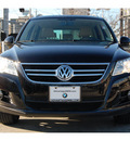 volkswagen tiguan 2009 black suv gasoline 4 cylinders front wheel drive automatic 77002