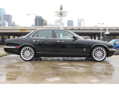 jaguar xjr 2006 black sedan gasoline 8 cylinders rear wheel drive automatic 77002