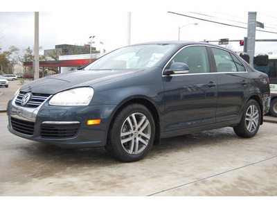 volkswagen jetta 2006 blue sedan tdi diesel 4 cylinders front wheel drive 5 speed manual 77002