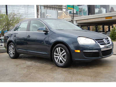 volkswagen jetta 2006 blue sedan tdi diesel 4 cylinders front wheel drive 5 speed manual 77002