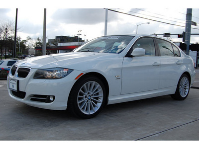 bmw 3 series 2009 white sedan 335xi gasoline 6 cylinders all whee drive automatic 77002