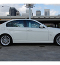 bmw 3 series 2009 white sedan 335xi gasoline 6 cylinders all whee drive automatic 77002