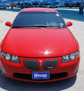 pontiac gto 2004 red coupe gasoline 8 cylinders rear wheel drive 6 speed manual 76206