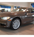 bmw 335i 2012 mahogany metallic sedan gasoline 6 cylinders rear wheel drive automatic with overdrive 77002