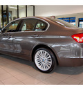 bmw 335i 2012 mahogany metallic sedan gasoline 6 cylinders rear wheel drive automatic with overdrive 77002