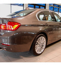 bmw 335i 2012 mahogany metallic sedan gasoline 6 cylinders rear wheel drive automatic with overdrive 77002