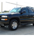 chevrolet tahoe 2005 black suv z71 gasoline 8 cylinders 4 wheel drive automatic 77002