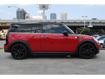 mini cooper clubman 2009 red hatchback john cooper works gasoline 4 cylinders front wheel drive 6 speed manual 77002