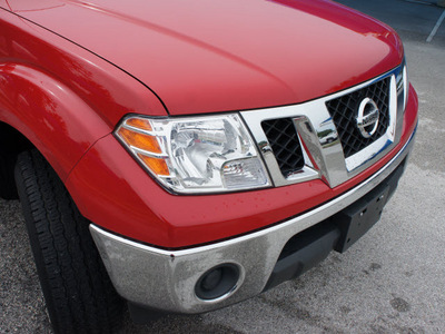 nissan frontier 2010 red pickup truck se gasoline 6 cylinders 2 wheel drive automatic 76206