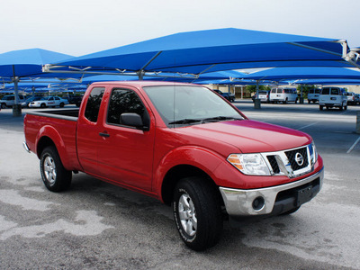 nissan frontier 2010 red pickup truck se gasoline 6 cylinders 2 wheel drive automatic 76206