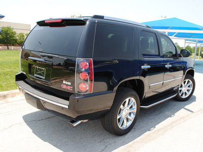 gmc yukon 2011 onyx blk suv denali flex fuel 8 cylinders all whee drive 6 speed automatic 76206