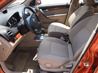 chevrolet aveo 2007 orange sedan ls gasoline 4 cylinders front wheel drive automatic 77301