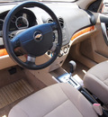 chevrolet aveo 2007 orange sedan ls gasoline 4 cylinders front wheel drive automatic 77301