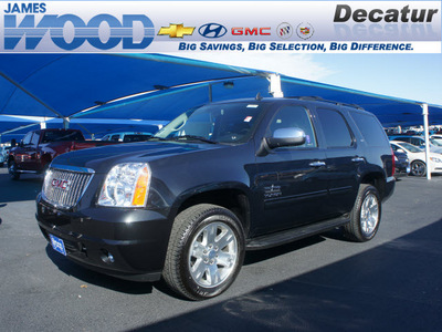 gmc yukon 2012 black suv slt flex fuel 8 cylinders 4 wheel drive 6 speed automatic 76234